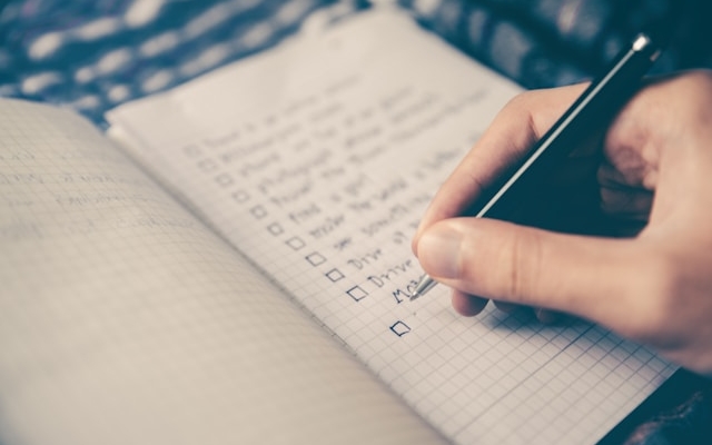 a clipboard with a checklist representing a quality audit